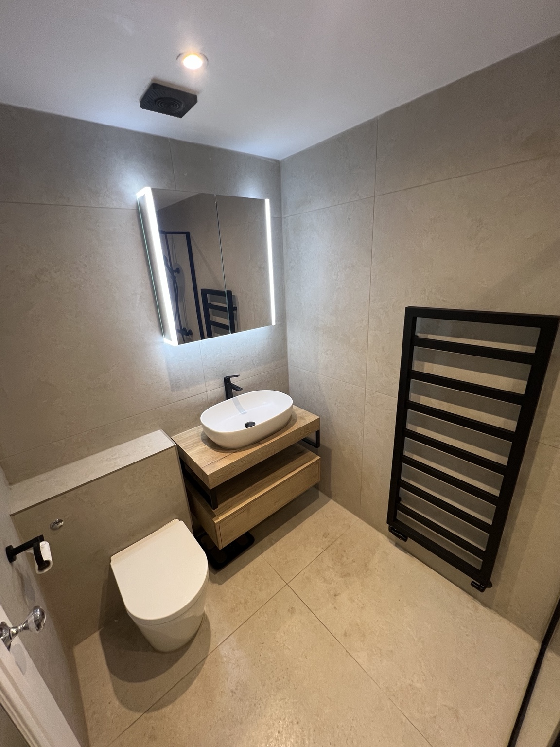 Completed bathroom project by Ario Construction Ltd
